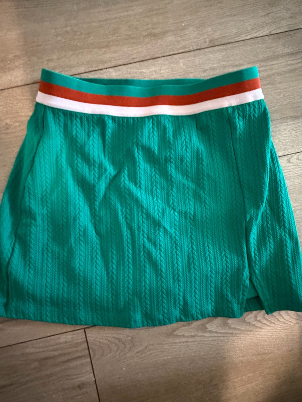 Beach Riot Green Tennis Skirt with Red and White Waistband